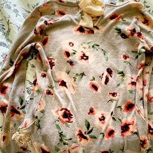 A long sleeve with a bow I’m the back